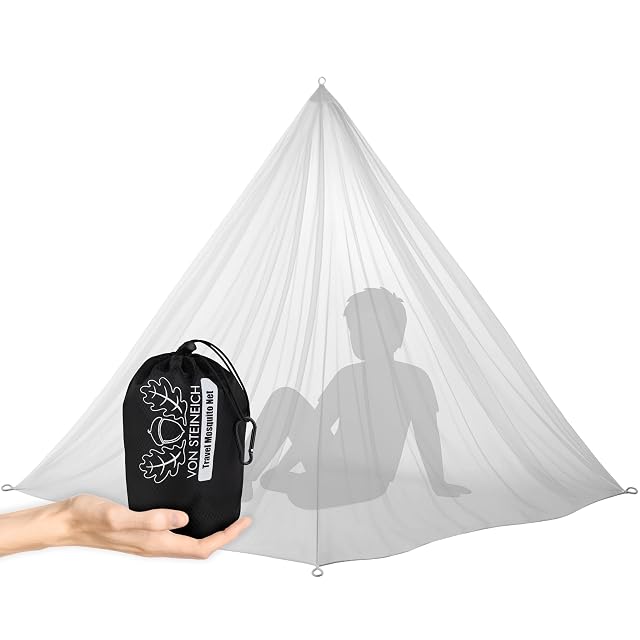 VON STEINEICH travel mosquito net hung from a carabiner hook above a camp bed