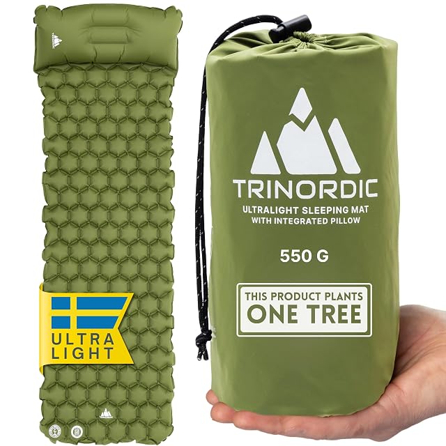 TRINORDIC ultralight inflatable camping mat rolled beside its inflatable pillow