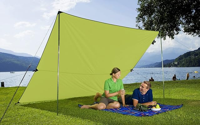 BERGER ultralight camping tarp pitched as a sun canopy with poles